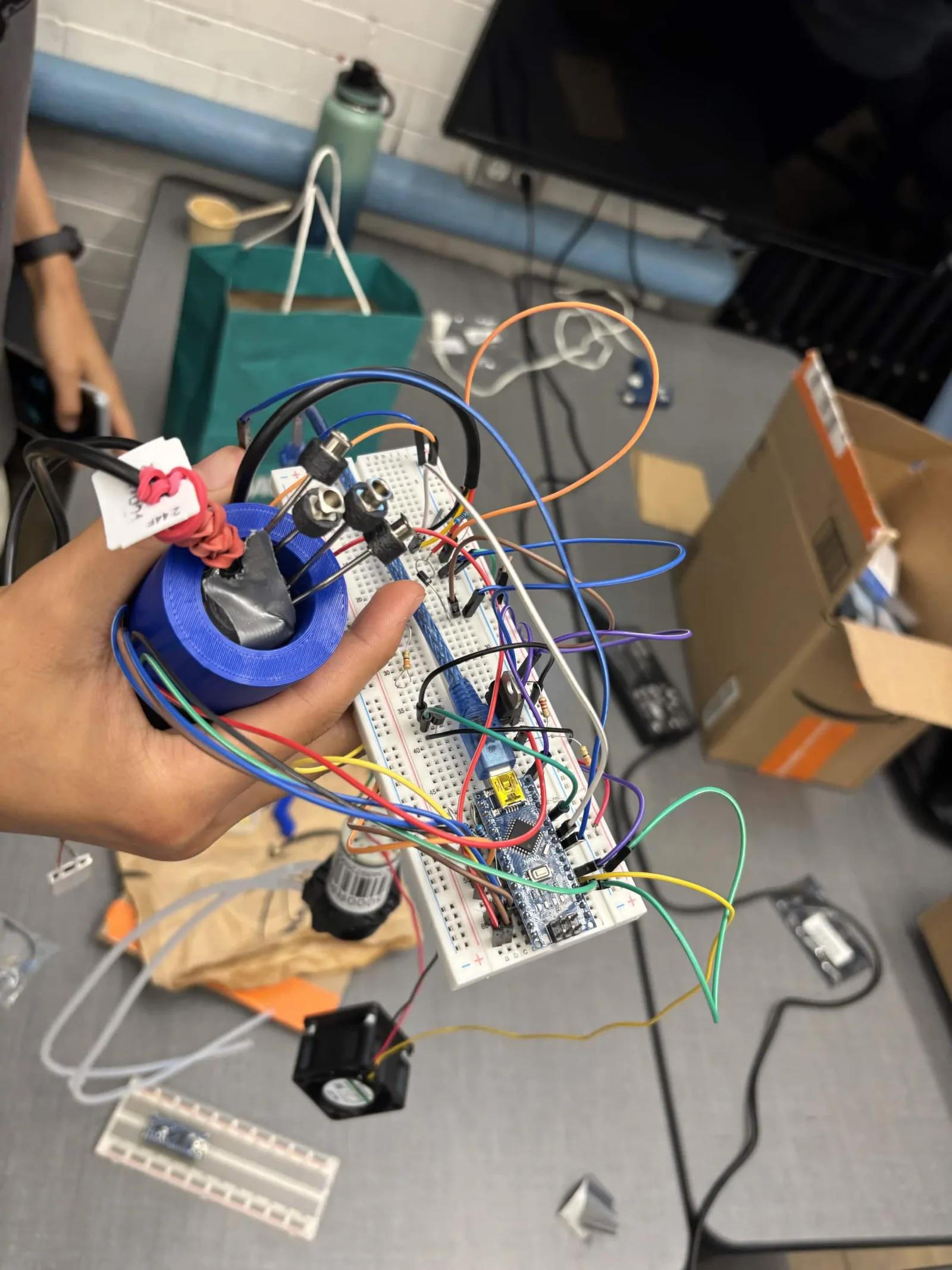A bioreactor subsystem coil wired to an Arduino Nano controller, late July 2026