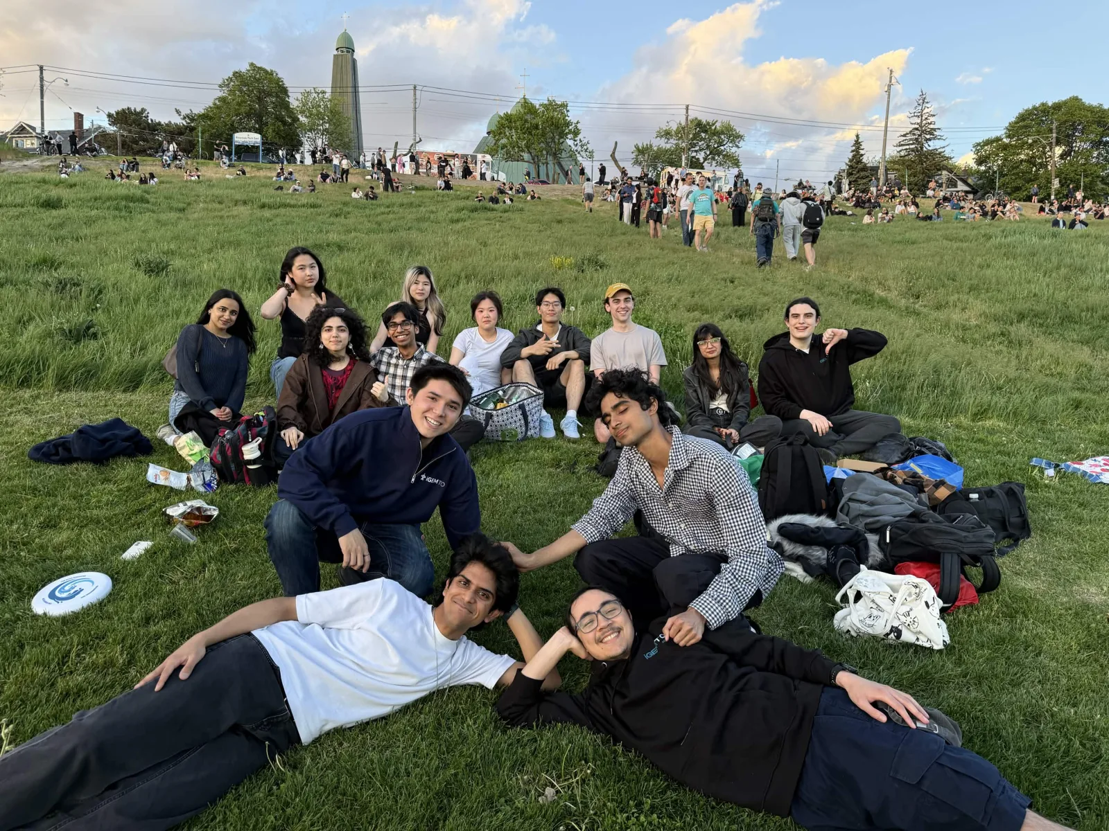 Large team group photo during an evening park outing