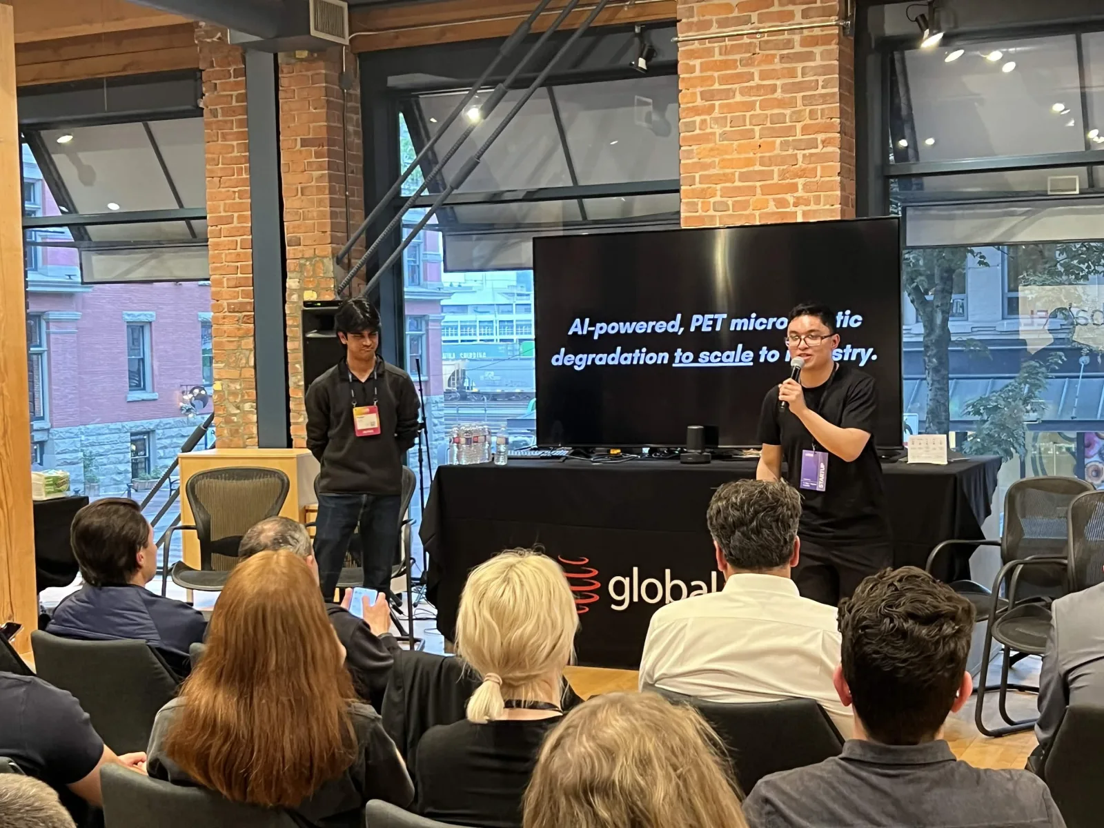 Team presents AI-powered PET microplastic degradation work to an industry audience, May 2026
