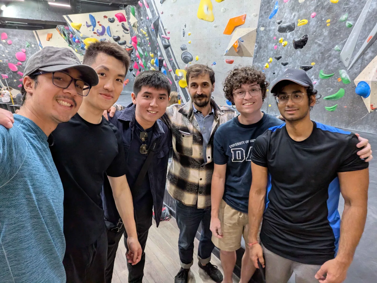 Team members at a climbing gym — informal hangout, 23 July 2026