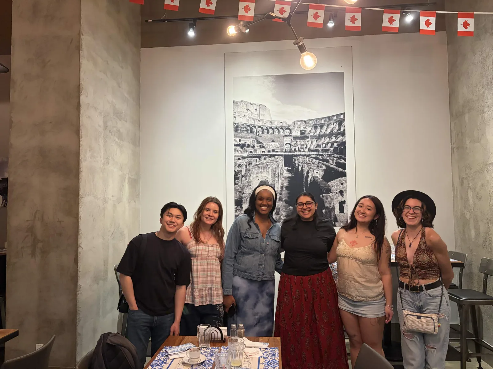 Team dinner at a restaurant strung with Canadian flag bunting